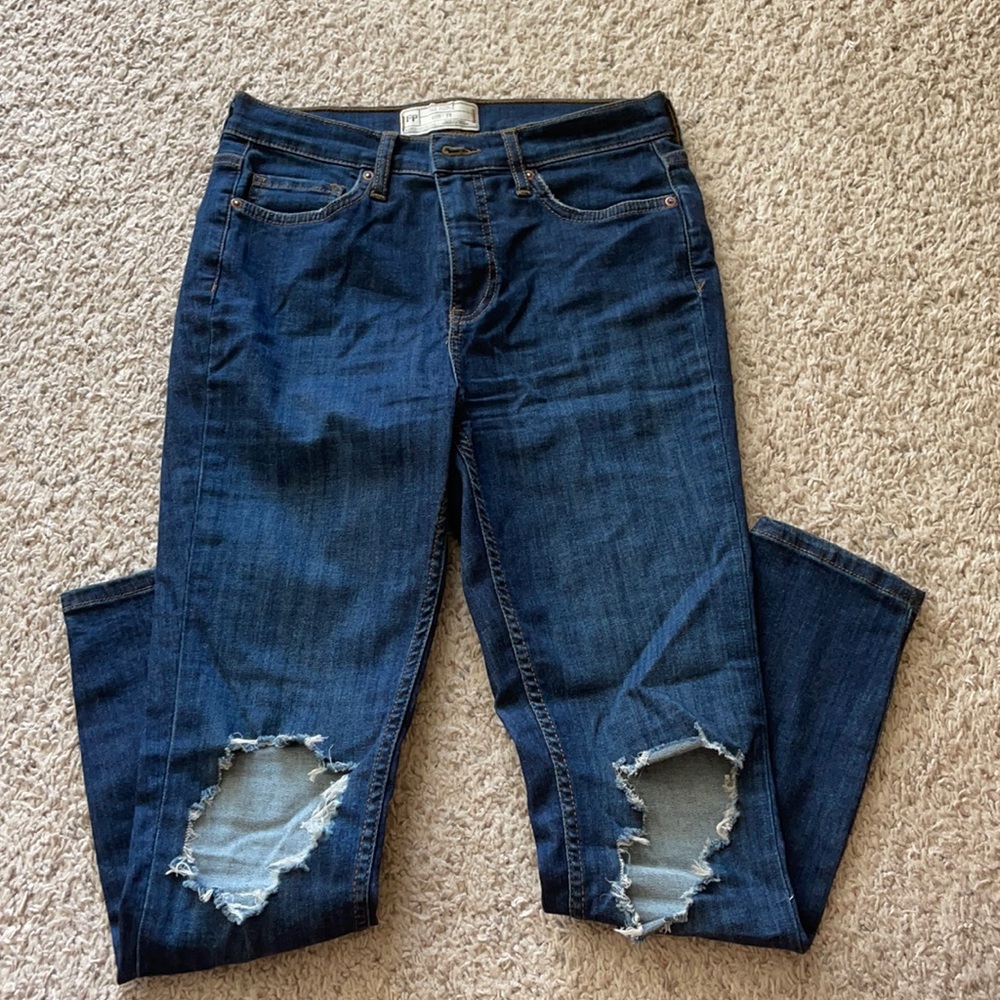 Free people busted knee skinny jeans.